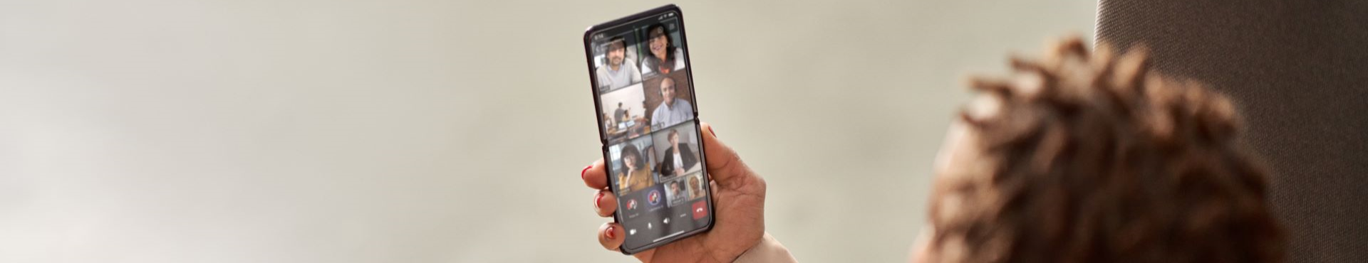 Teams Phone meeting and laptop with presentation on the screen.