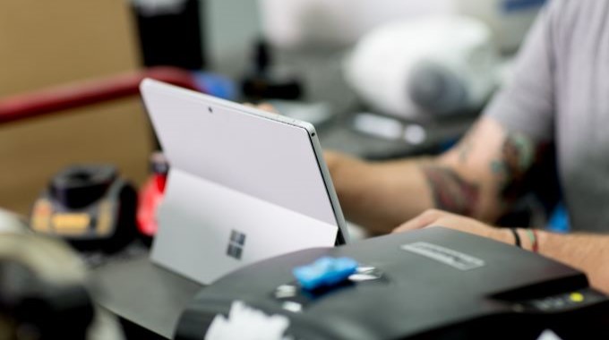 Person using Microsoft Surface tablet
