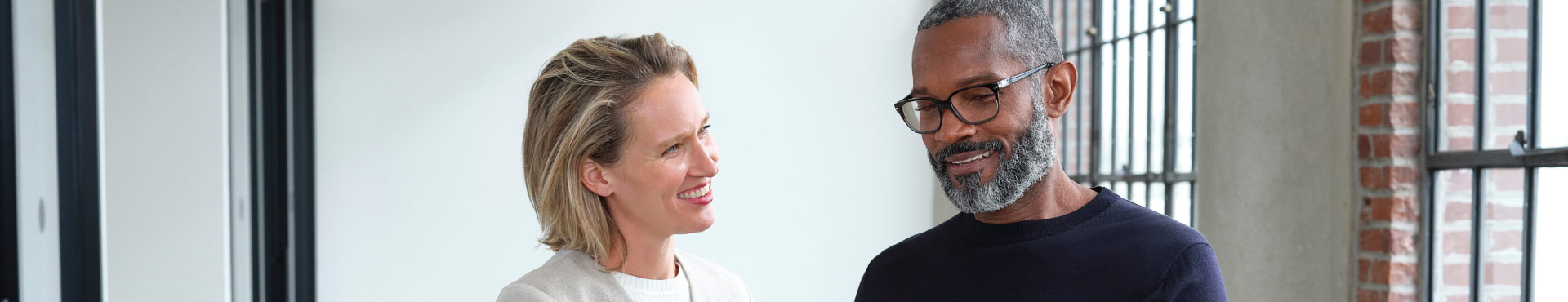 A professional presents project details to a client.