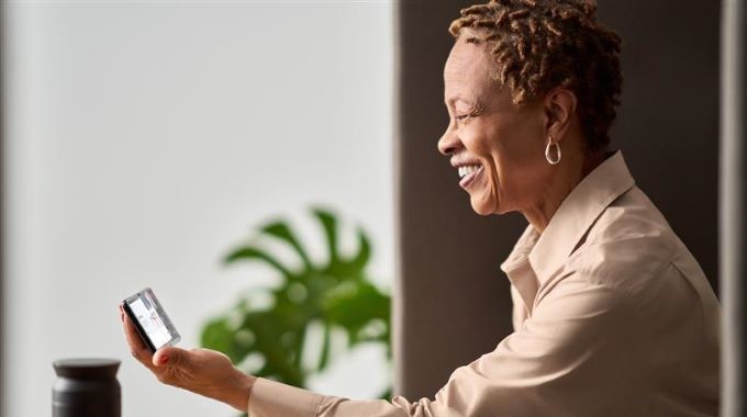 Woman smiling while talking on Teams Phone